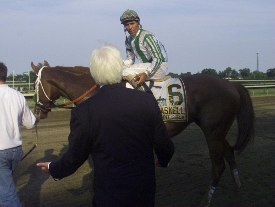 Point Given jockey Gary Stevens screams at trainer Bob Baffert about his racing instructions after winning the Haskell Invitational at Monmouth Park Sunday August 5.