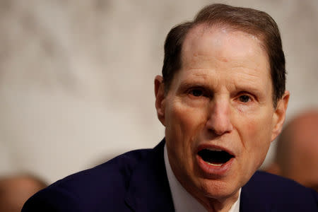 FILE PHOTO: Sen. Ron Wyden (D-OR) speaks during a markup on the "Tax Cuts and Jobs Act" on Capitol Hill in Washington, U.S., November 15, 2017. REUTERS/Aaron P. Bernstein