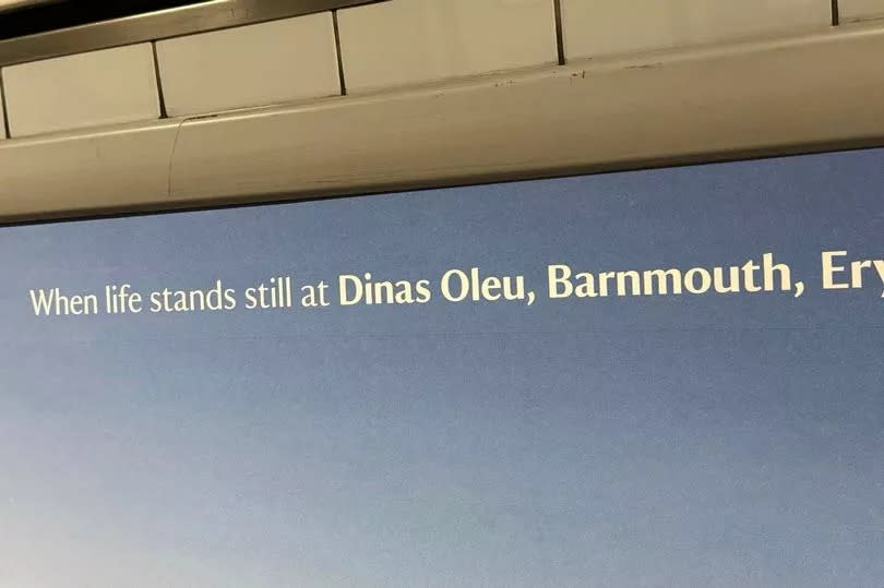 National Trust poster of Dinas Oleu, Barmouth, at Euston underground station in London