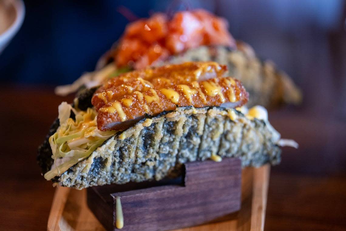 Taco Tonkatsu, $10, includes pork cutlet, cucumber, cabbage, avocado, mustard and honey sauce on a seaweed shell at Engawa Fusion restaurant on Stockton Boulevard in south Sacramento on Saturday, May 4, 2024.