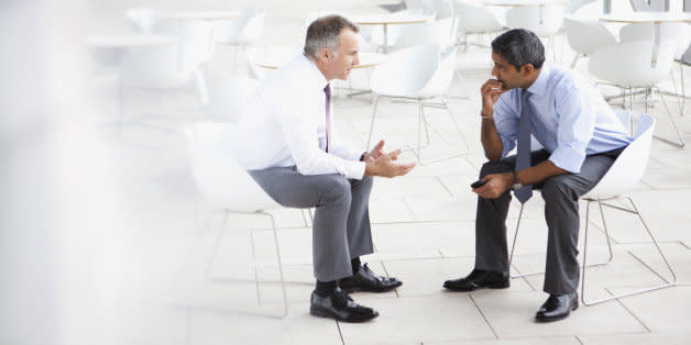 Businessmen in meeting (Photo: )