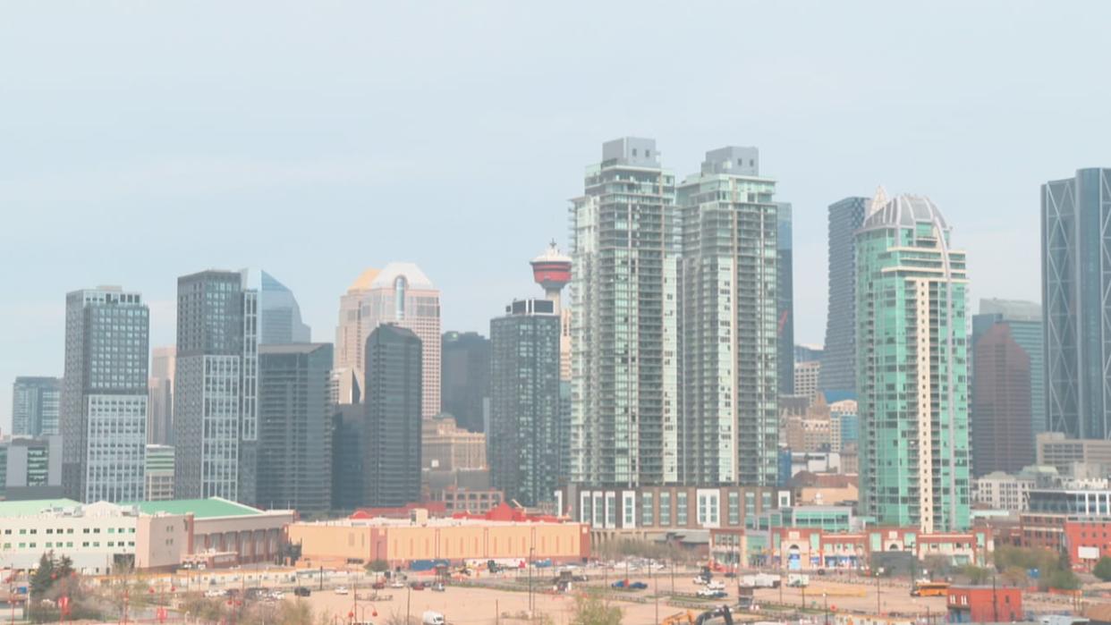 A veil of smoke clouds a view of downtown Calgary on Sunday morning. (Taylor Braat/CBC - image credit)