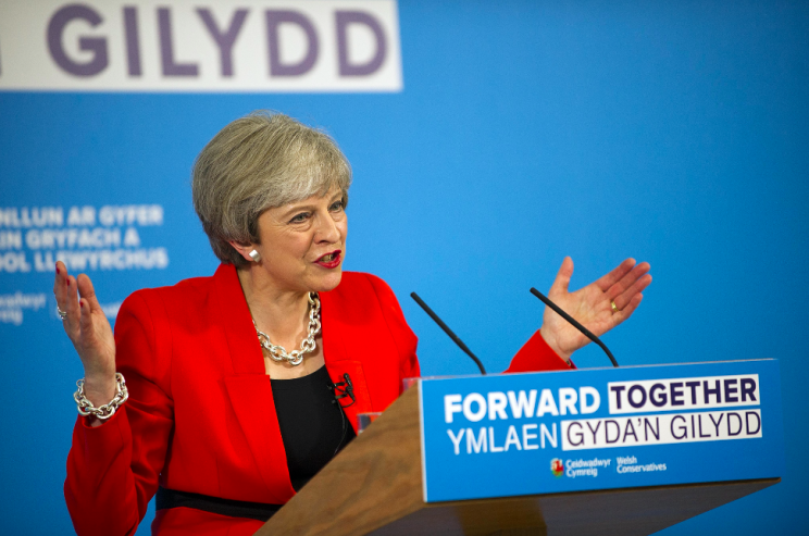 The lady is for turning... Theresa May has changed her mind again (Picture: Rex)