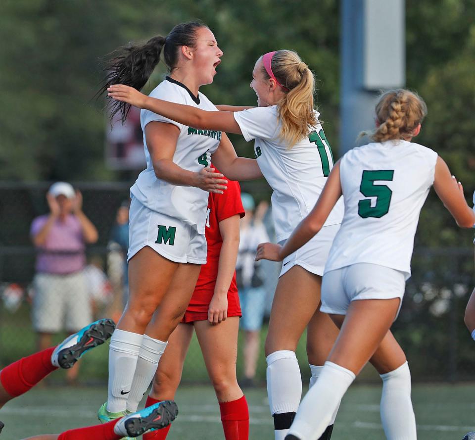 Marshfield's Lyndsay Bekerian (No. 4) celebrates her goal that gave the Rams a 1-0 upset win at Hingham in the season opener for both teams on Tuesday, Sept. 12, 2023.