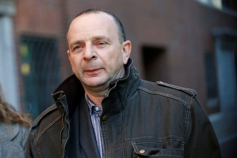 Test administrator Igor Dvorskiy leaves the federal courthouse in Boston