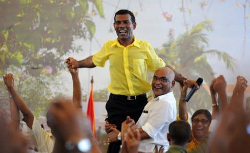 Former Maldives president Mohamed Nasheed greets supporters in Male in February 2012. A Commonwealth-backed investigation in the Maldives dismissed claims that a coup forced Nasheed from the presidency in February and declared it was a legitimate transfer of power