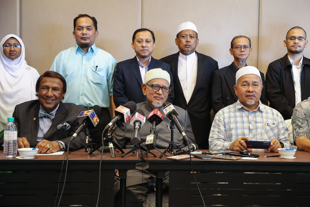 Tan Sri Abdul Jadir Sheikh Fadzir, Datuk Seri Abdul Hadi Awang and Datuk Seri Tuan Ibrahim attend a press conference in Putrajaya August 26, 2019. — Picture by Yusof Mat Isa