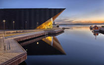 The striking contemporary architecture of the Kilden Performing Arts Centre in Kristiansand welcomes visitors to operas and a diverse array of concerts.