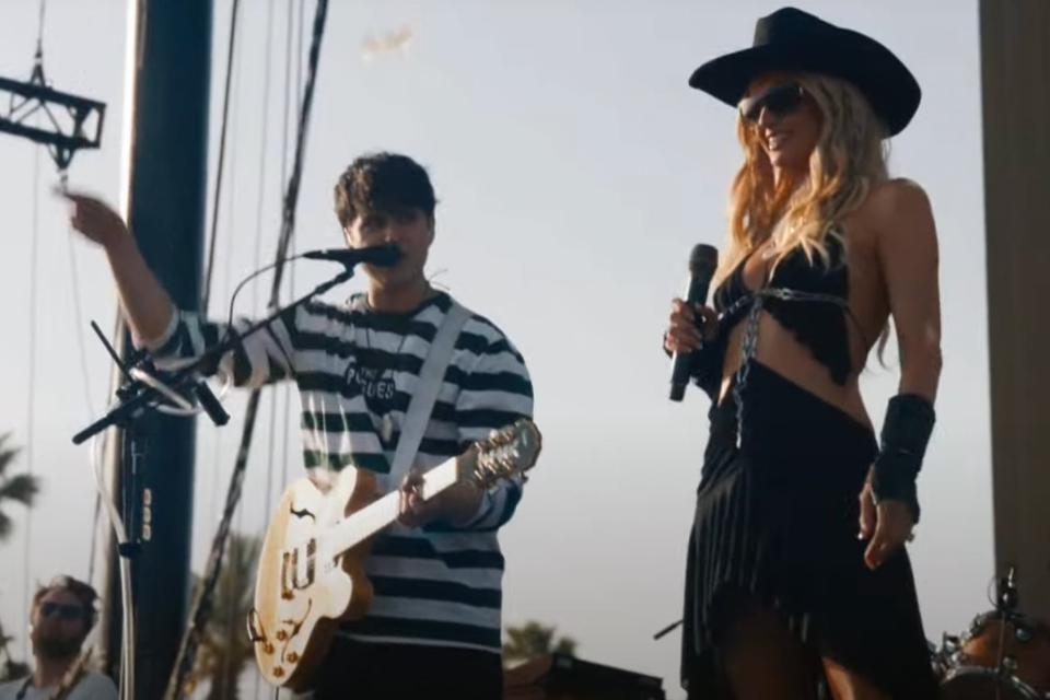 Vampire Weekend and Paris Hilton onstage at Coachella 2024 (YouTube)