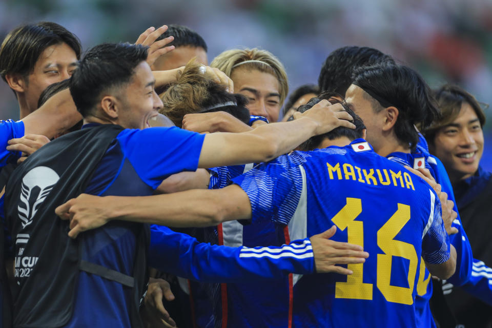 Japan's celebrate their third goal during the Asian Cup round of 16 soccer match between Japan and Bahrain at Al Thumama Stadium in Doha, Qatar, Wednesday, Jan. 31, 2024. (AP Photo/Hussein Sayed)