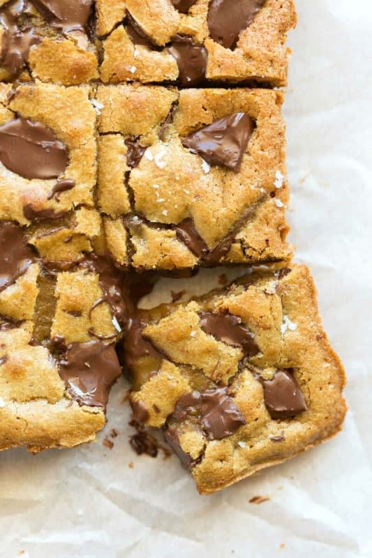 <p>The Big Man's World</p><p>Hands down, these are the best ever blondies recipe made with easy ingredients. Thick, gooey, and loaded with chocolate chips, they take less than 20 minutes to make!</p><p><strong>Get the recipe: <a href="https://thebigmansworld.com/vegan-gluten-free-blondies/" rel="nofollow noopener" target="_blank" data-ylk="slk:Vegan Blondies;elm:context_link;itc:0;sec:content-canvas" class="link ">Vegan Blondies</a></strong></p>