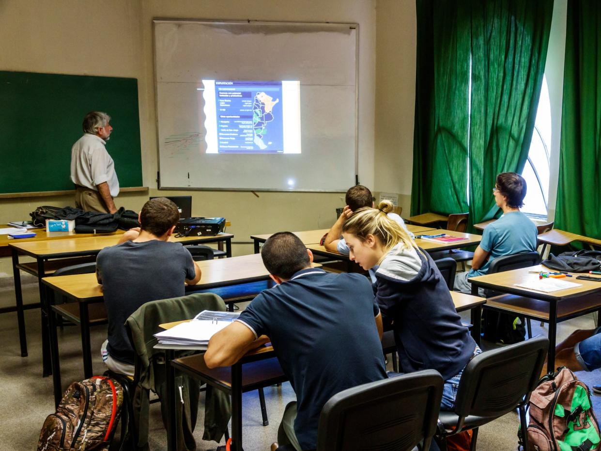 a classroom of students in Argentina looking at a screen