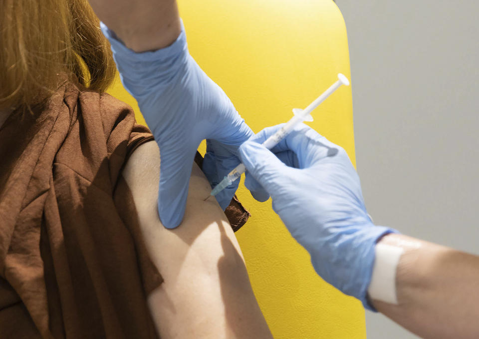 A person receives an AstraZeneca injection. Source: AP