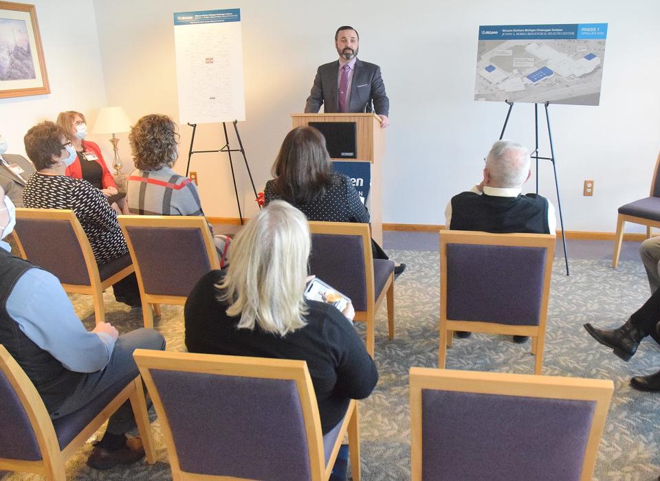 Todd Burch (above, center), president and CEO of McLaren Northern Michigan, speaks at a press conference Monday at the McLaren Northern Michigan Cheboygan Campus of the hospital's plans to build a behavioral health unit and partial hospitalization program in Cheboygan.