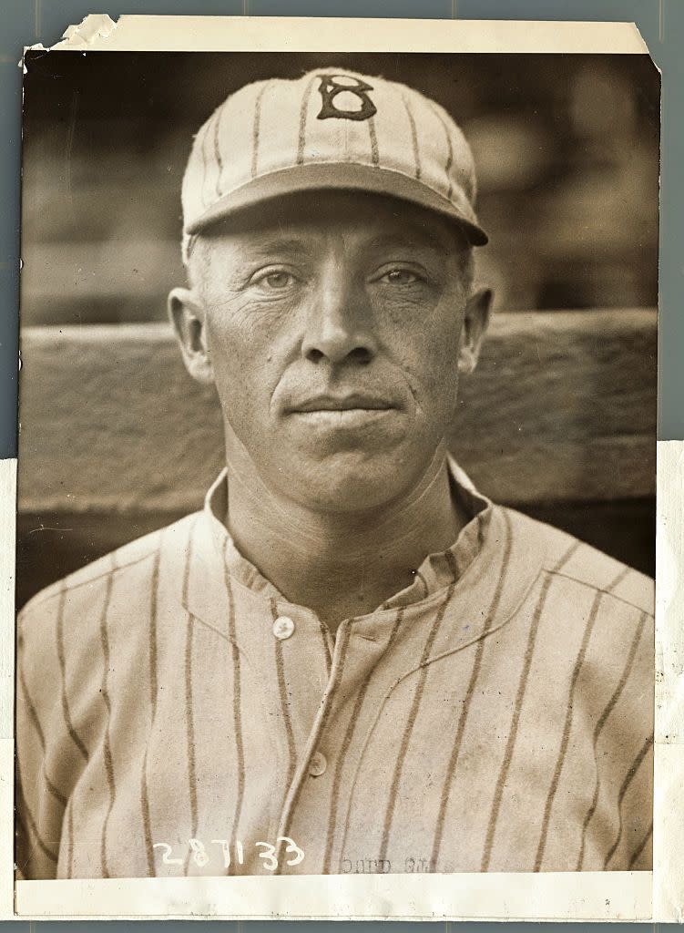 jimmy johnston looks directly at the camera, unsmiling, wearing a baseball uniform