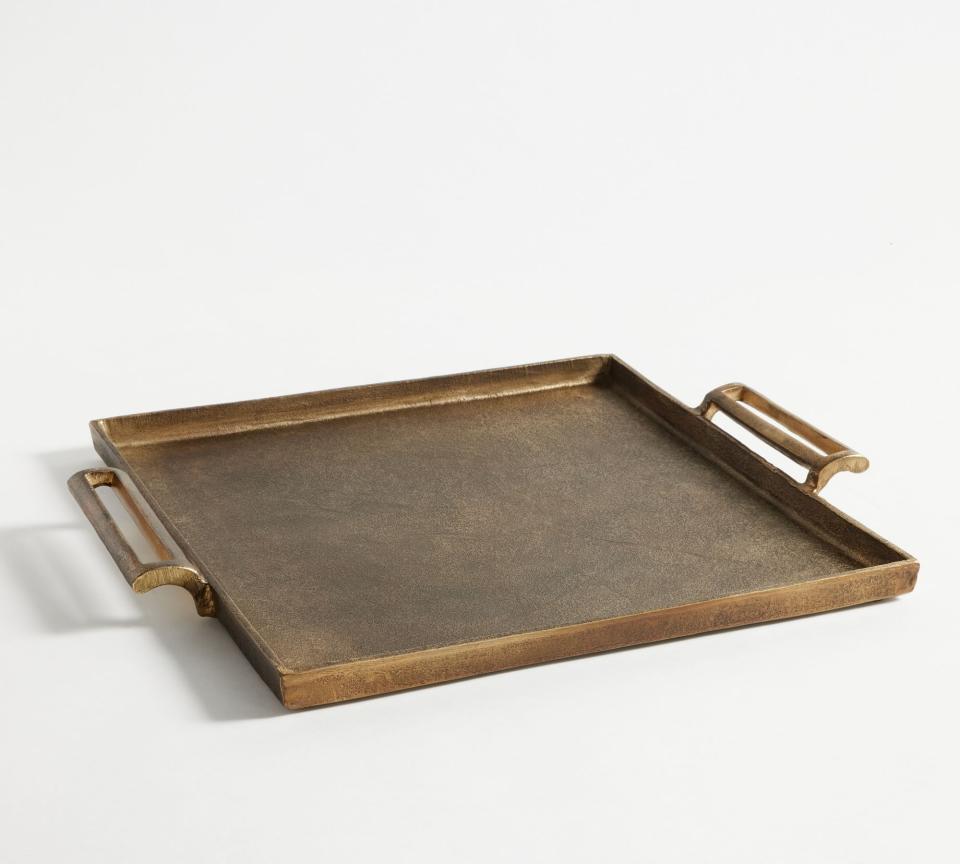 <p><strong>Pottery Barn</strong></p><p>potterybarn.com</p><p><strong>$149.00</strong></p><p>The antique tray has so many uses, especially for the couple that likes to eat and be entertained together. They're great for tv dinners, delivering cocktails, or to present some charcuterie when pals are over.</p>