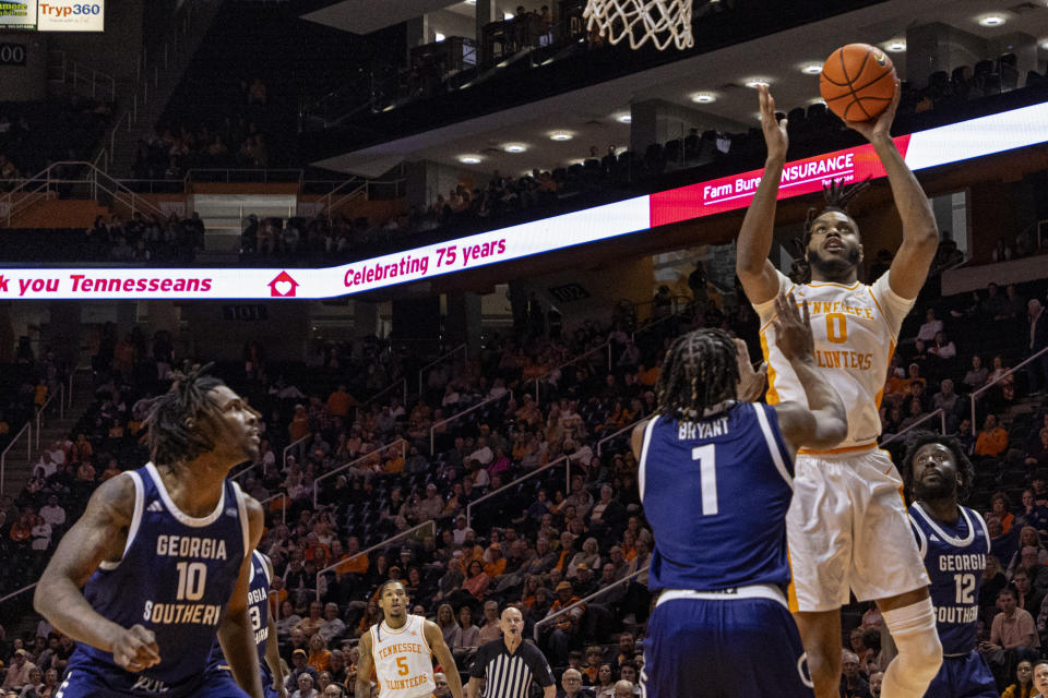 Tennessee forward Jonas Aidoo (0) shoots over Georgia Southern forward Cam Bryant (1) during the first half of an NCAA college basketball game, Tuesday, Dec. 12, 2023, in Knoxville, Tenn. (AP Photo/Wade Payne)