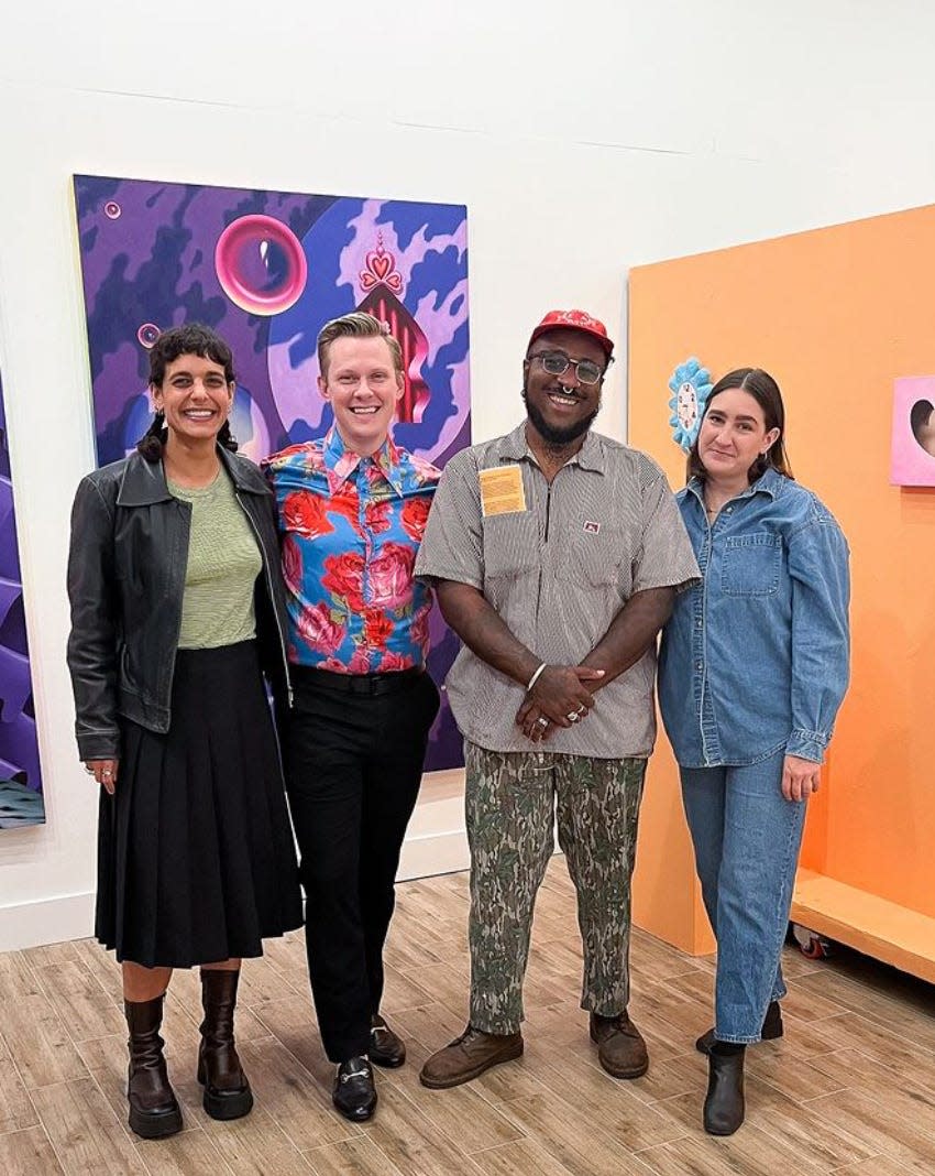 Three of Cleo the Gallery's exhibiting artists pose with Director Jeanette McCune (far right).