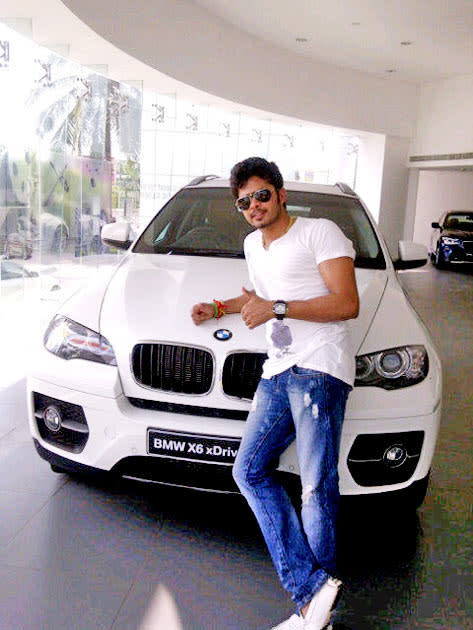 Sreesanth drives a white BMW X6, too.