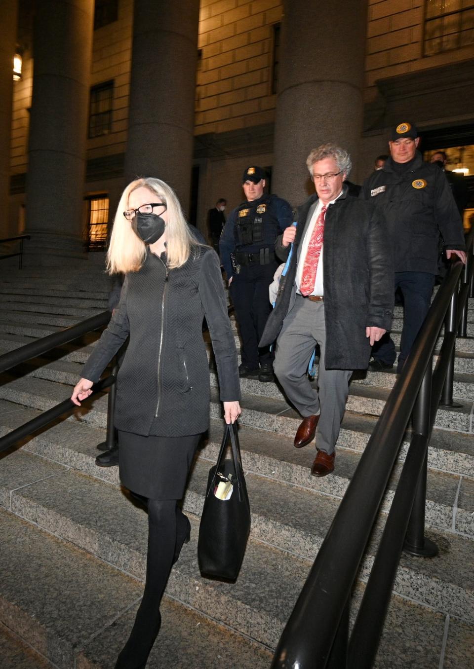 Defence lawyers Laura Menninger (left) and Jeffrey Pagliuca (middle right) leaving the federal courthouse after Maxwell was convicted (Anthony Behar/PA) (PA Wire)