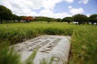 A grave marker for an unknown casualty from the USS Arizona is shown at the National Memorial Cemetery of the Pacific on Thursday, July 15, 2021 in Honolulu. Advances in DNA technology have allowed the U.S. military to exhume and identify the remains of hundreds of sailors and Marines buried as unknowns from the bombing of Pearl Harbor, decades after the 1941 attack that launched the U.S. into World War II. But the Defense POW/MIA Accounting Agency, which is responsible for locating and identifying missing servicemen and women, says it won't be able to do the same for those from the battleship that lost the most men that day: the USS Arizona. (AP Photo/Caleb Jones)