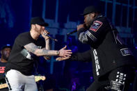 <p>It was hard to live up to Beyoncé for sure, but <a rel="nofollow" href="https://www.yahoo.com/entertainment/eminem-upstaged-mentor-dr-dre-uneven-coachella-set-093519472.html" data-ylk="slk:Eminem tried his lyric-spitting best;elm:context_link;itc:0;sec:content-canvas;outcm:mb_qualified_link;_E:mb_qualified_link;ct:story;" class="link  yahoo-link">Eminem tried his lyric-spitting best</a>. His act, on April 15, included an appearance by his onetime protégé 50 Cent. (Photo: Kevin Mazur/Getty Images for Coachella) </p>