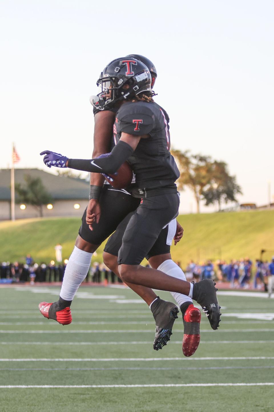 Tascosa’s TJ Tillman (4) celebrates a touchdown with a teammate during a non district game against Palo Duro, Thursday night, October 24, 2023, at Dick Bivins Stadium, in Amarillo, Texas. Tascosa won 28-7.