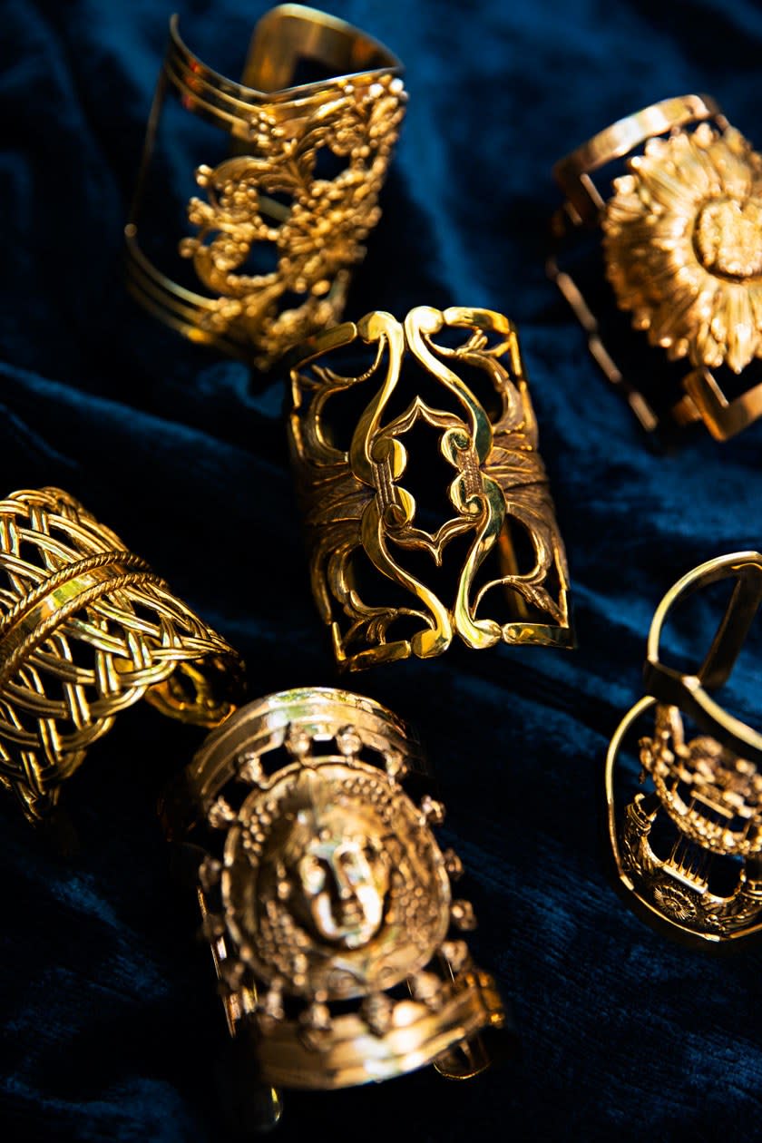 Cuffs. Clockwise from top left: Acanthus, Sunflower, Lyre, Dionysus, Basketweave, Palmette (center).