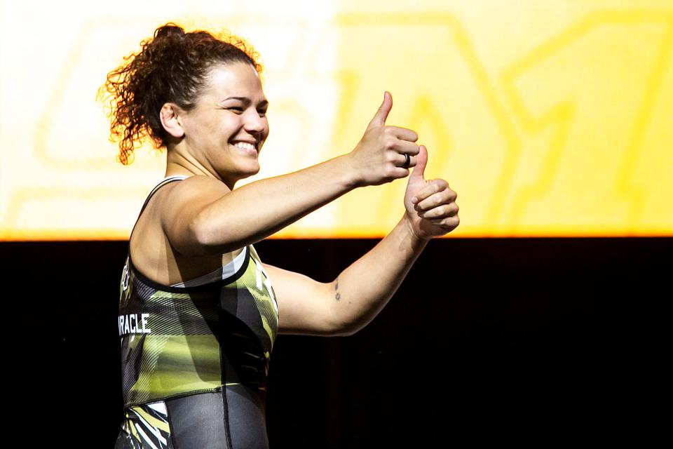 Kayla Miracle gives two thumbs up while being introduced during weigh ins before RUDIS Wrestling Super Match 1 on March 15 at the Sound Board Theater in MotorCity Casino in Detroit.