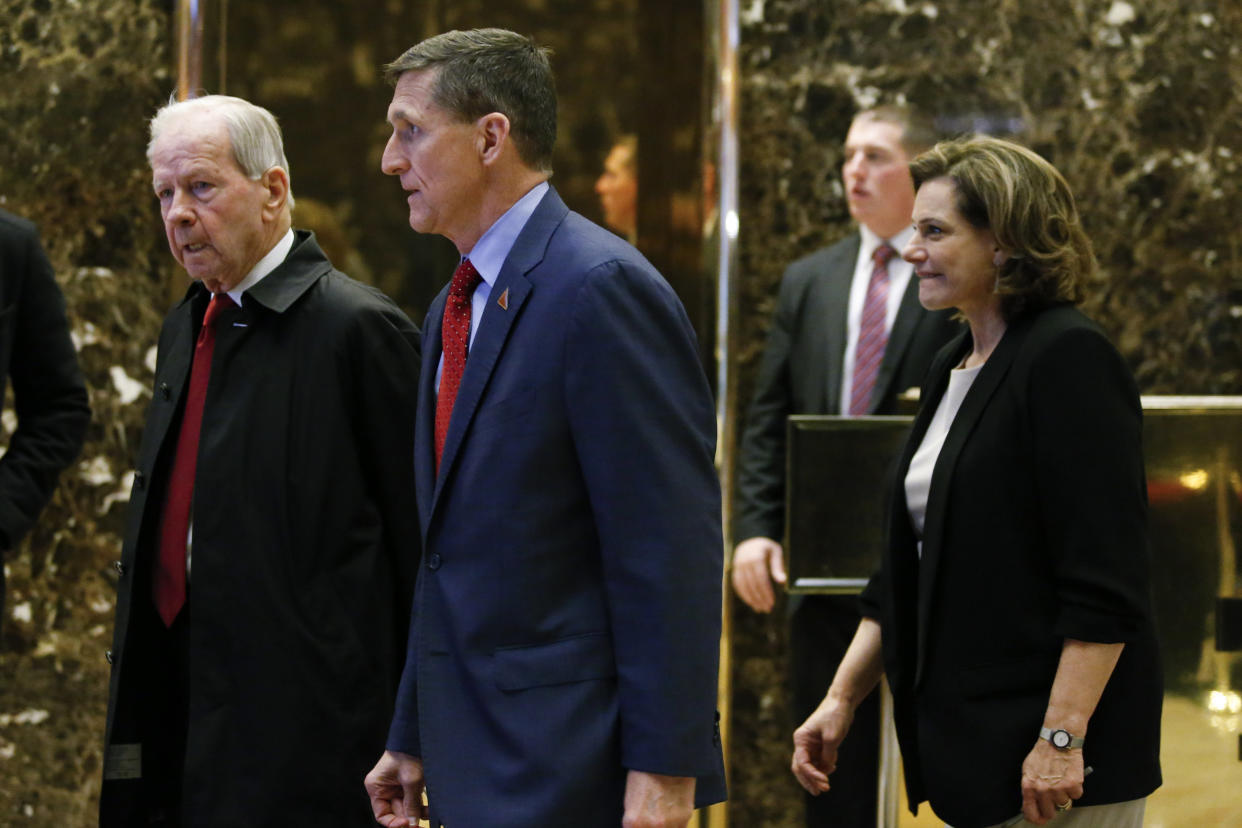 Robert. C. 'Bud' McFarlane, Michael Flynn and KT McFarland walk in the lobby at Trump Tower in New York on Dec. 5, 2016. (Photo: KENA BETANCUR via Getty Images)