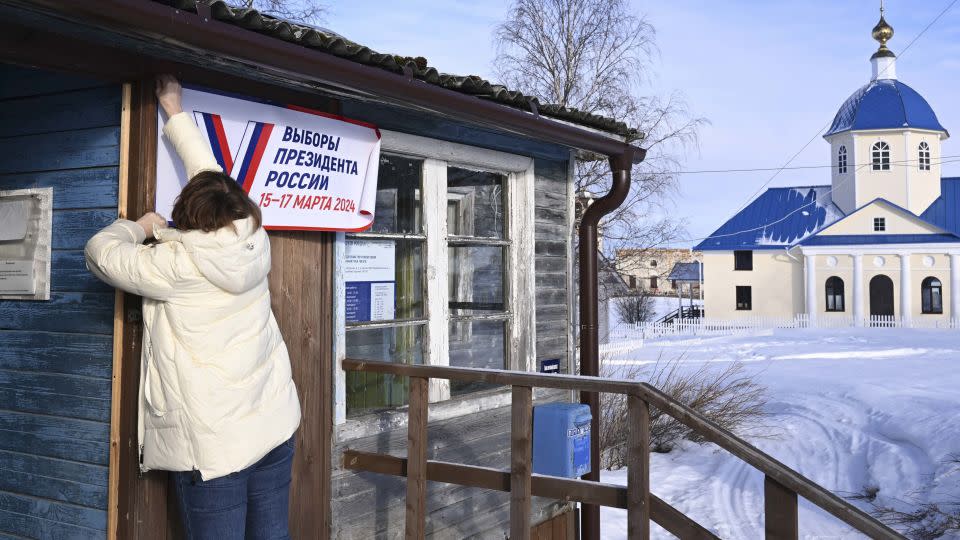 A local election commission member prepares a polling station for early voting in the Republic of Karelia, March 10, 2024. - Natalia Kolesnikova/AFP/Getty Images