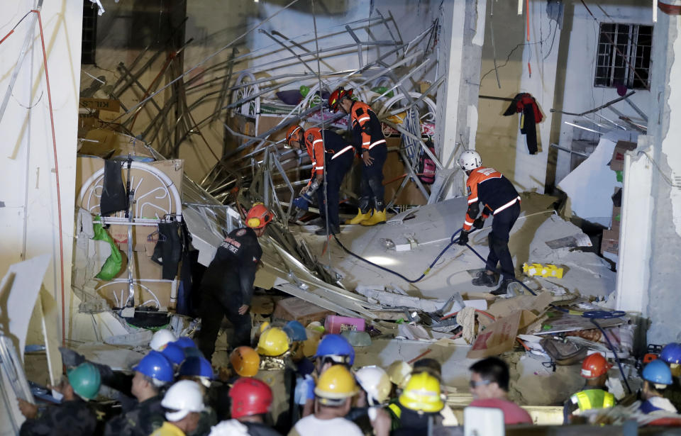 Rescuers continue to search for survivors following the earthquake that caused the collapse of a commercial building in Porac township, north of Manila in the Philippines. 