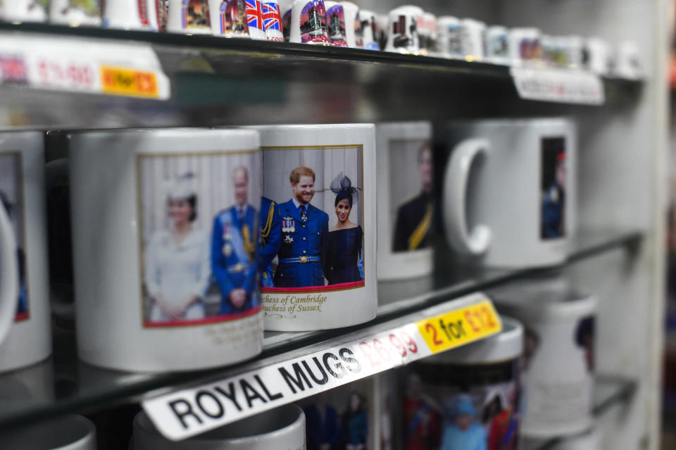 Merchandise featuring Prince Harry, Duke of Sussex and Meghan, Duchess of Sussex is seen on sale in London.