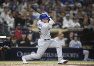 Los Angeles Dodgers' Will Smith (16) hits an RBI single during the fourth inning of a baseball game against the San Diego Padres Wednesday, June 23, 2021, in San Diego. (AP Photo/Denis Poroy)