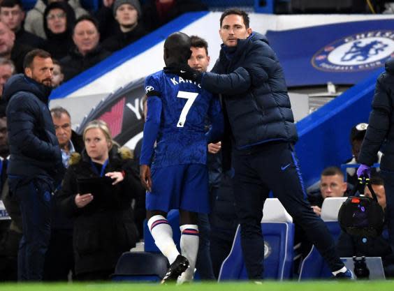 Lampard consoles Kante after hobbling off after 12 minutes (EPA)