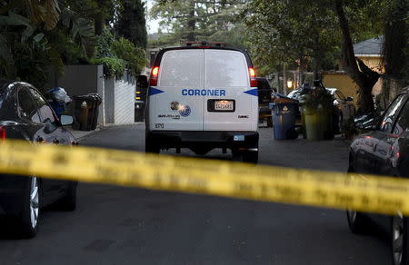 The Los Angeles County Coroner van arrives at the house of Andrew Getty, 47, in the Hollywood Hills section of Los Angeles, California March 31, 2015. REUTERS/Kevork Djansezian