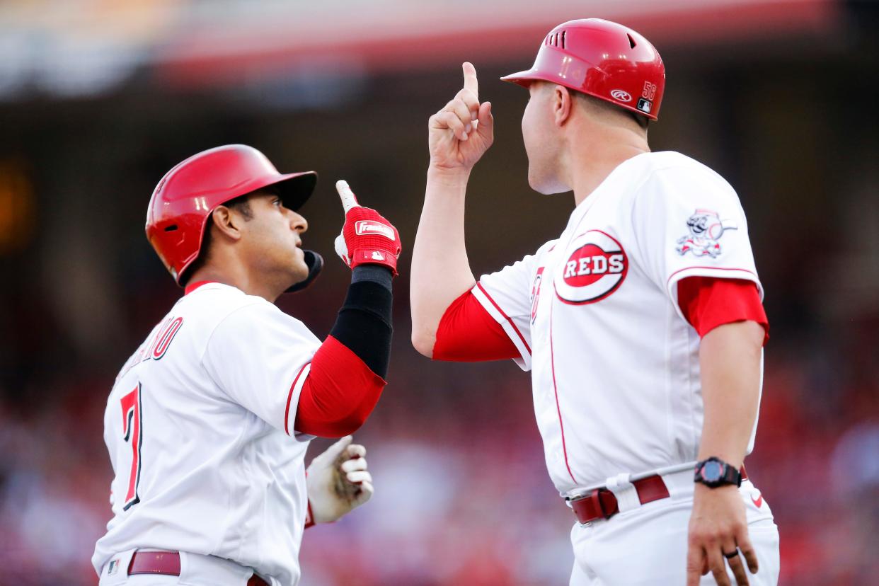 Cincinnati Reds designated hitter Donovan Solano (7) rounds third on a two-run home run in the second inning of the MLB National League game between the Cincinnati Reds and the St. Louis Cardinals at Great American Ball Park in downtown Cincinnati on Friday, July 22, 2022.