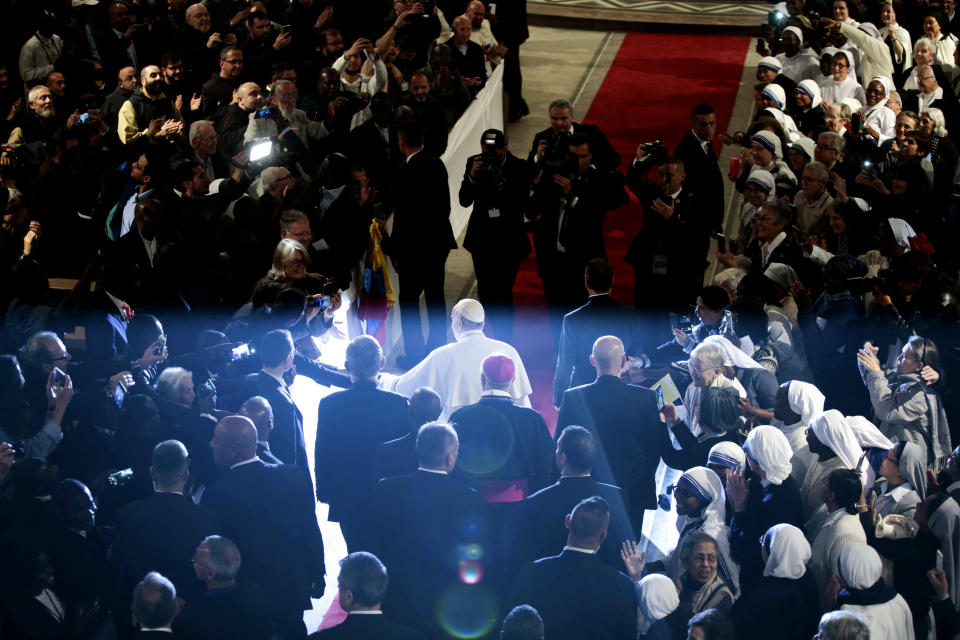 Pope Francis arrives for a meeting with Catholic priests and other Christian representatives in the cathedral of the capital, Rabat, Morocco, Sunday, March 31, 2019. Pope Francis is in Morocco for a two-day trip aimed at highlighting the North African nation's Christian-Muslim ties, while also showing solidarity with migrants at Europe's door and tending to a tiny Catholic flock. (AP Photo/Mosa'ab Elshamy)