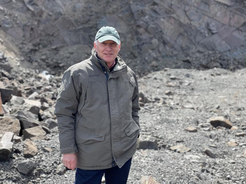 Réjean Carrier, president of Carboniq Inc., stands in a quarry he hopes to convert into a mine for the cement industry. "It will bring good jobs to the area," he said.