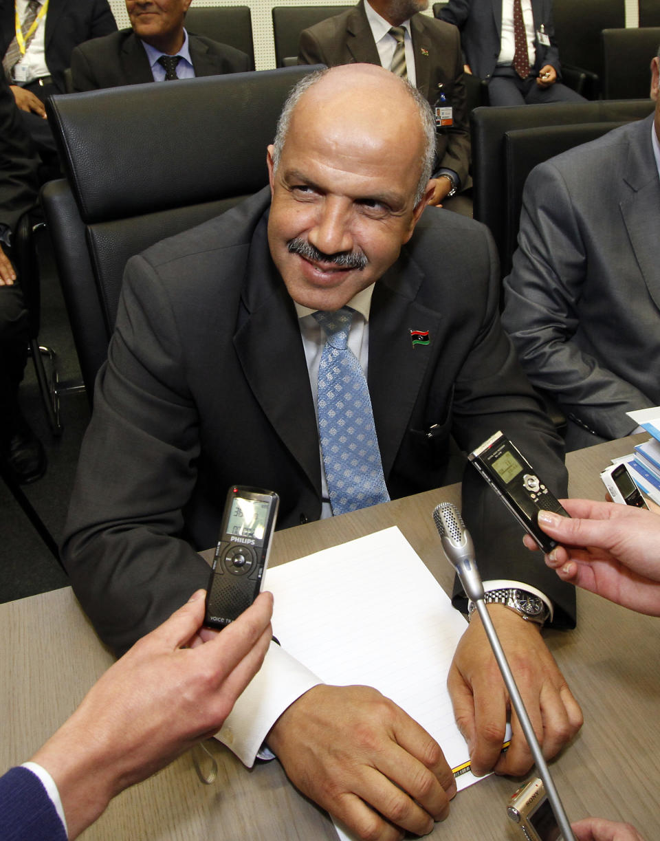 Libya's Minister of Oil and Gas Abdurahman Benyezza speaks to journalists prior to the start of the meeting of the Organization of the Petroleum Exporting Countries, OPEC, at their headquarters in Vienna, Austria, on Thursday, June 14, 2012. The meeting of the 12 oil ministers of the OPEC focuses on price and production targets. (AP Photo/Ronald Zak)