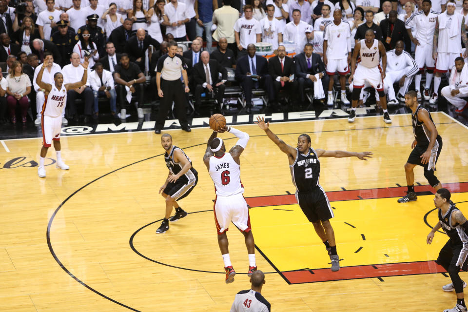 MIAMI, FL - JUNE 20: LeBron James #6 of the Miami Heat shoots against Kawhi Leonard #2 of the San Antonio Spurs during Game Seven of the 2013 NBA Finals on June 20, 2013 at American Airlines Arena in Miami, Florida. NOTE TO USER: User expressly acknowledges and agrees that, by downloading and or using this photograph, User is consenting to the terms and conditions of the Getty Images License Agreement. Mandatory Copyright Notice: Copyright 2013 NBAE (Photo by Joe Murphy/NBAE via Getty Images)