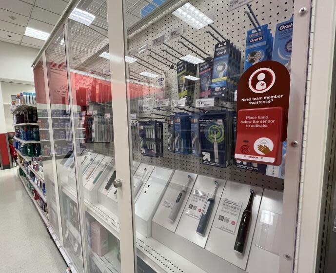 Toothbrushes are among the many products now locked behing security glass at a Target in Pasadena.