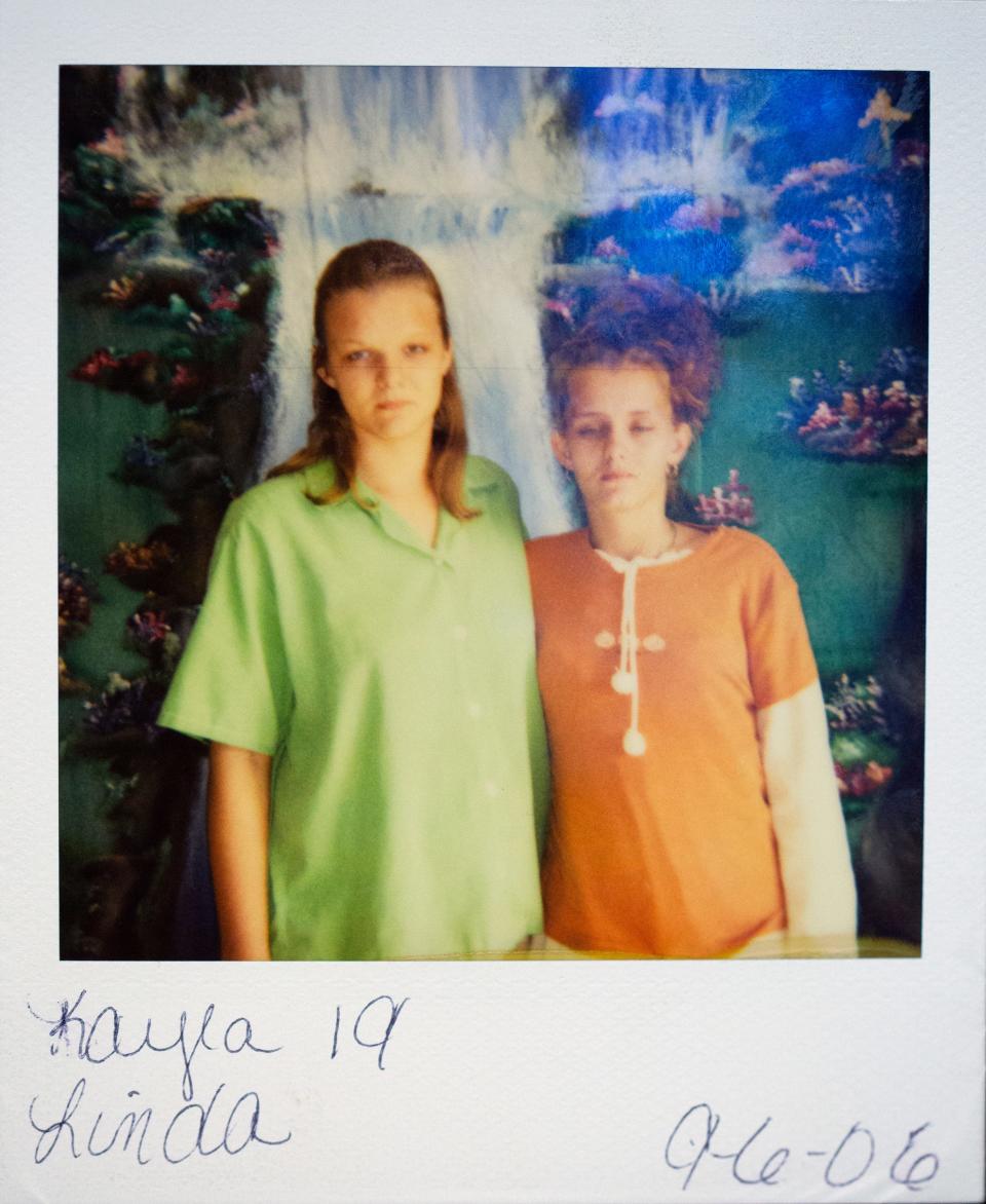 A polaroid taken September 6, 2006, of Kayla Artessia, 19, left, and Linda Mills, 21, taken when Kayla was serving a year in prison for attempting to smuggle in drugs to the jail.  Both women allege they were victims of 
Phillip Malone, 64, when they were 15. He took nude photos of them and had sexual relations. Malone is a former Scioto County Sheriff's dispatcher and former probation officer with the city of Portsmouth. He was fired from both jobs. Malone denies all allegations. Rumors have long circulated in the small city of Portsmouth about men in power taking advantage of vulnerable women. Michael Mearan, prominent Portsmouth attorney, is part of an 80-page affidavit created by the Drug Enforcement Administration in 2015 to obtain permission to wiretap several phone, including Mearan's. It alleges he is part of a sex trafficking network.
