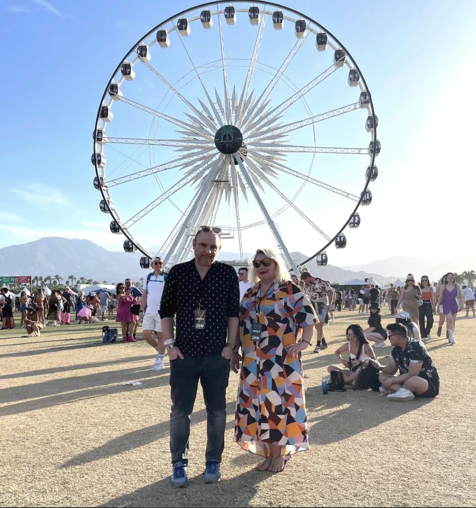 Lynn Carratt and her brother in front of coachella ferris wheel