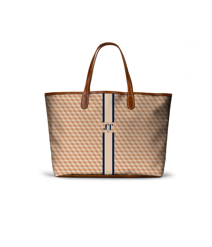 <p>Customize your print and monogram. The St. Anne Tote, $180, <a rel="nofollow noopener" href="https://www.barringtongifts.com/pre-spring-2018-monogram/the-st-anne-tote-pre-spring-2018-monogram-stripe.html" target="_blank" data-ylk="slk:barringtongifts.com;elm:context_link;itc:0;sec:content-canvas" class="link ">barringtongifts.com</a> </p>