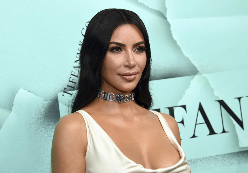 FILE - This Oct. 9, 2018 file photo shows Kim Kardashian West at the Tiffany & Co. 2018 Blue Book Collection: The Four Seasons of Tiffany celebration in New York. Kardashian's reality series "Keeping Up with the Kardashians" will end with their 20th season this year. (Photo by Evan Agostini/Invision/AP, File)