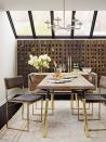 <p>In this dining room by <a href="https://www.catherinekwong.com/" rel="nofollow noopener" target="_blank" data-ylk="slk:Catherine Kwong Design;elm:context_link;itc:0;sec:content-canvas" class="link ">Catherine Kwong Design</a>, the entire back wall is dedicated to wine. It makes entertaining easier when you can simply grab and pour without even leaving the room. Plus, if your basement has a skylight, even more reason to turn into a special occasion room, right?</p>