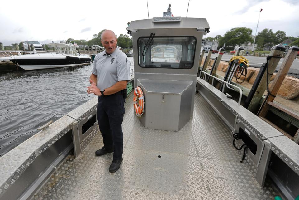 Isaac Perry inspects the Mattapoisett Harbormaster patrol boat. Isaac Perry long time Marion Harbormaster is the new Mattapoisett Harbormaster, a town he grew up in.