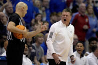 Kansas head coach Bill Self talks to an official during the second half of an NCAA college basketball game against Oklahoma State Saturday, Dec. 31, 2022, in Lawrence, Kan. Kansas won 69-67. (AP Photo/Charlie Riedel)