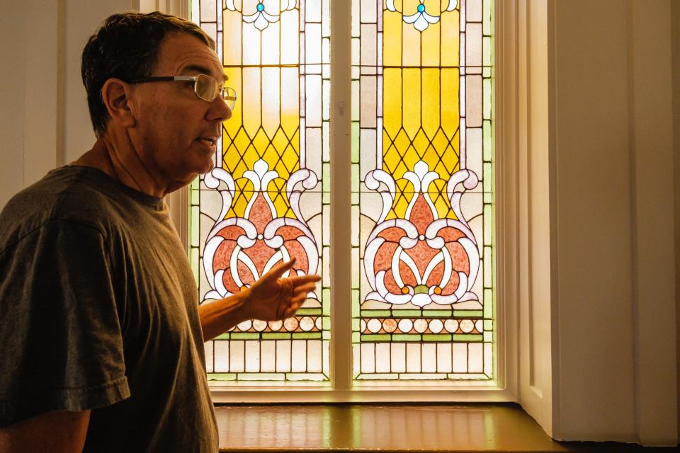 Bill Westbrook talks about the need to fix or replace aging stained glass windows at Sharon Moravian Church, Wednesday, June 14.